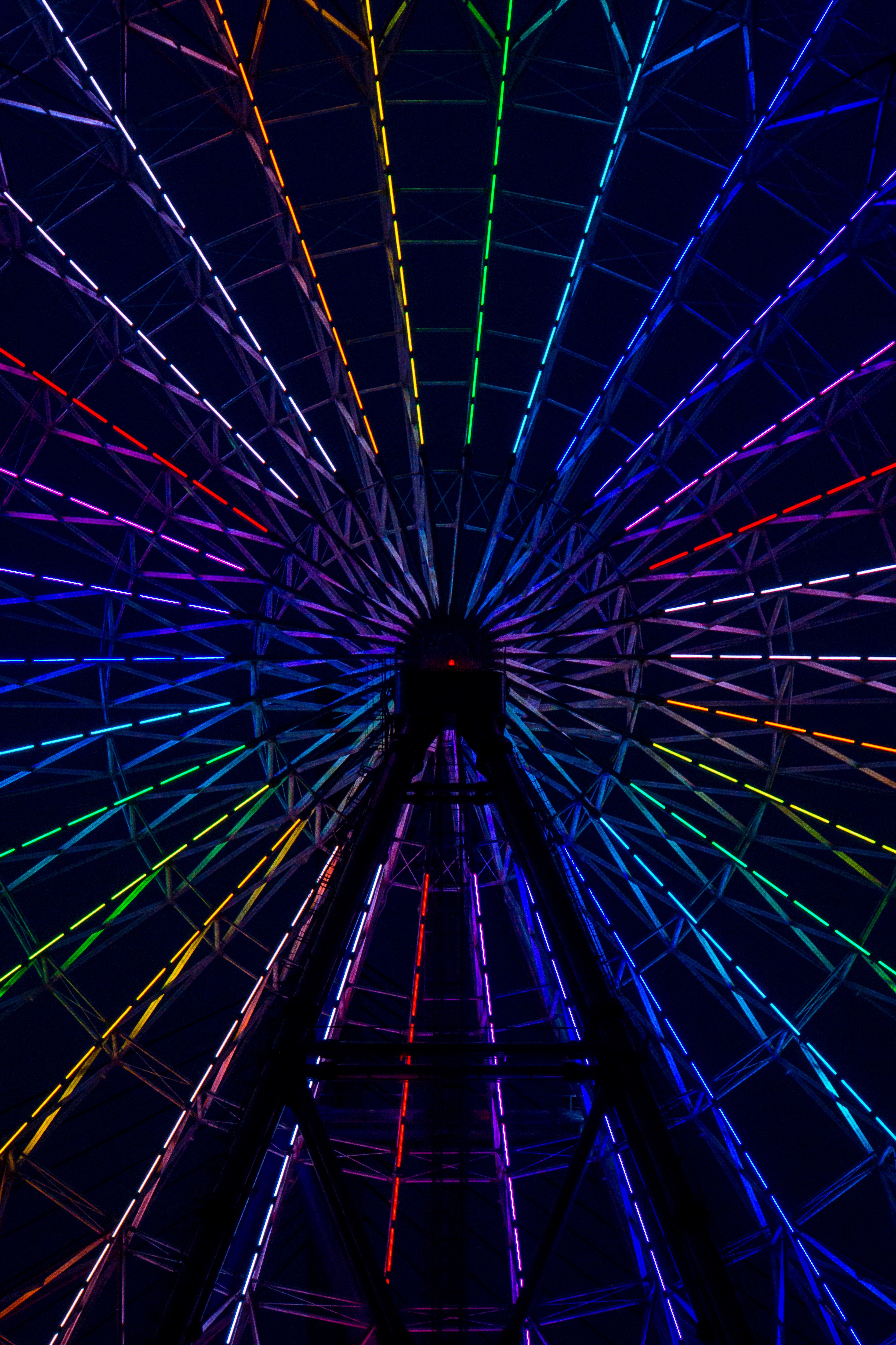 Photo of a rainbow light up ferris wheel