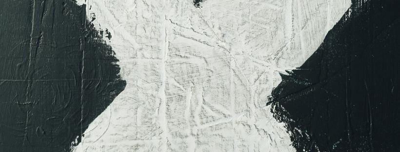 Acrylic painting with white cross and black background.