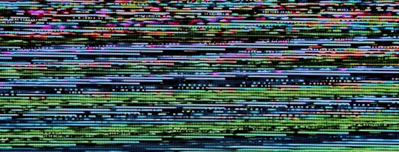 Glitchy television screen with colourful haphazard lines in pink, purple, and green.